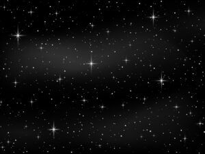 Fundo escuro representando o céu noturno, com muitas estrelas brancas de brilho variado
